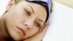 woman insomnia can't sleep bed