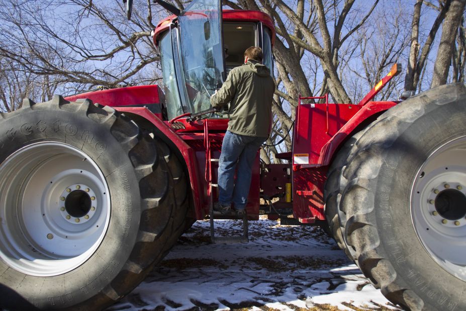 Tofteland climbs into a tractor on his farm. When word came in late October of the MF Global scandal, he thought everything he worked for might be lost. 