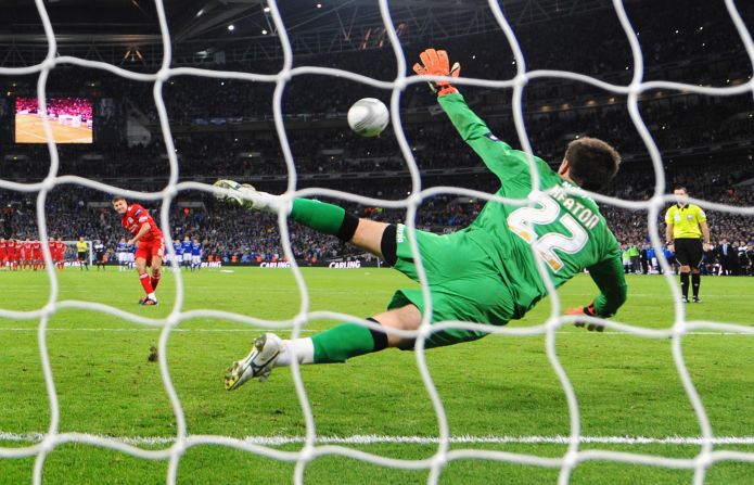 Liverpool made the worst possible start to the shootout when captain Steven Gerrard saw his kick wonderfully saved by Cardiff goalkeeper Tom Heaton.