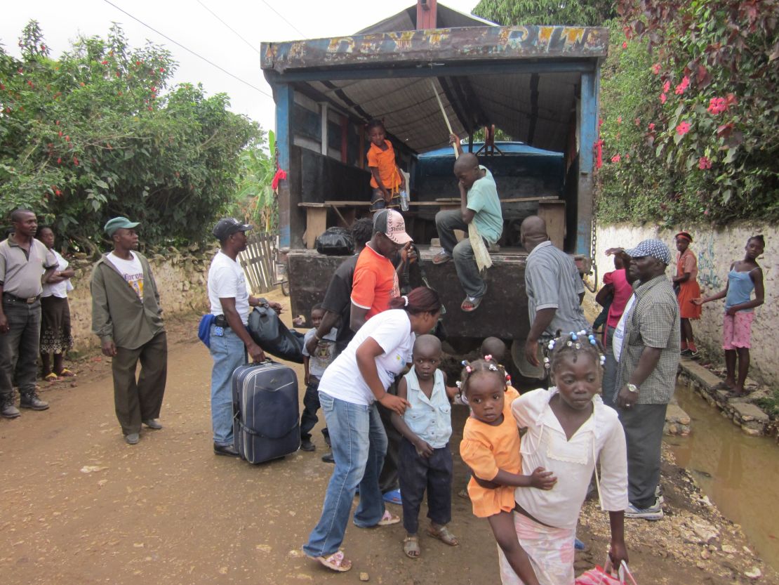 The end of the journey back to Haiti from the Dominican Republic marks a new start for these returnees.