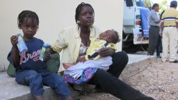 Natacha Polissaint and her children will live with family when they get back to Haiti because her house fell down in the earthquake.