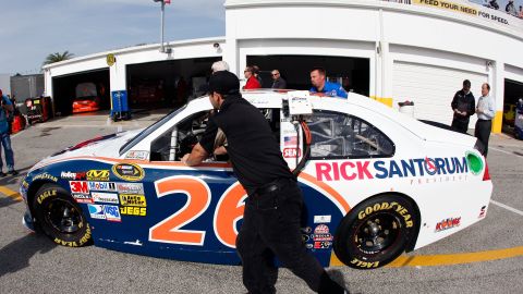 The #26 Ford, sponsored by Rick Santorum, is pushed Saturday during practice for the Daytona 500.