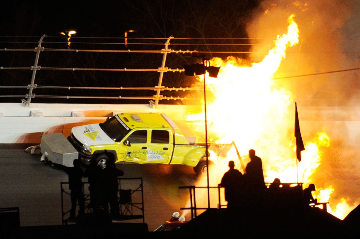 The race was delayed further when Colombian driver Juan Pablo Montoya crashed into one of the jet dryers which was drying the track, causing the car and the truck towing it to burst into flames.