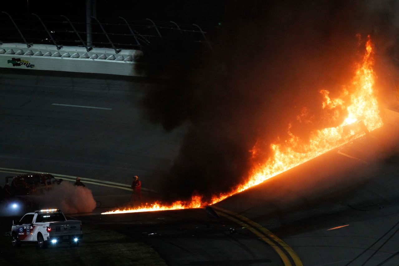 The flames spread across the track, forcing a near two-hour delay to proceedings.