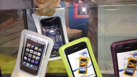 A low-tech solution to waterproofing: Phones are placed in airtight cases made by DiCAPac before being dunked.