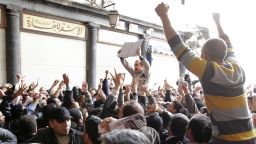 Hundreds of Syrians march in Damascus in March 2011, chanting "Daraa is Syria" as protests spread throughout the country.