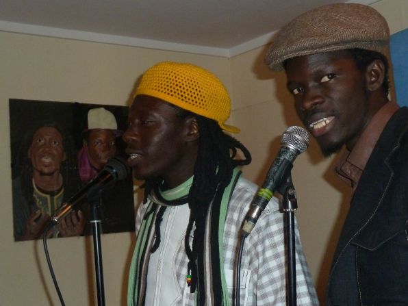 Daara J Family vocalists Faada Freddy (left) and N'Dongo D (right) in the studio.