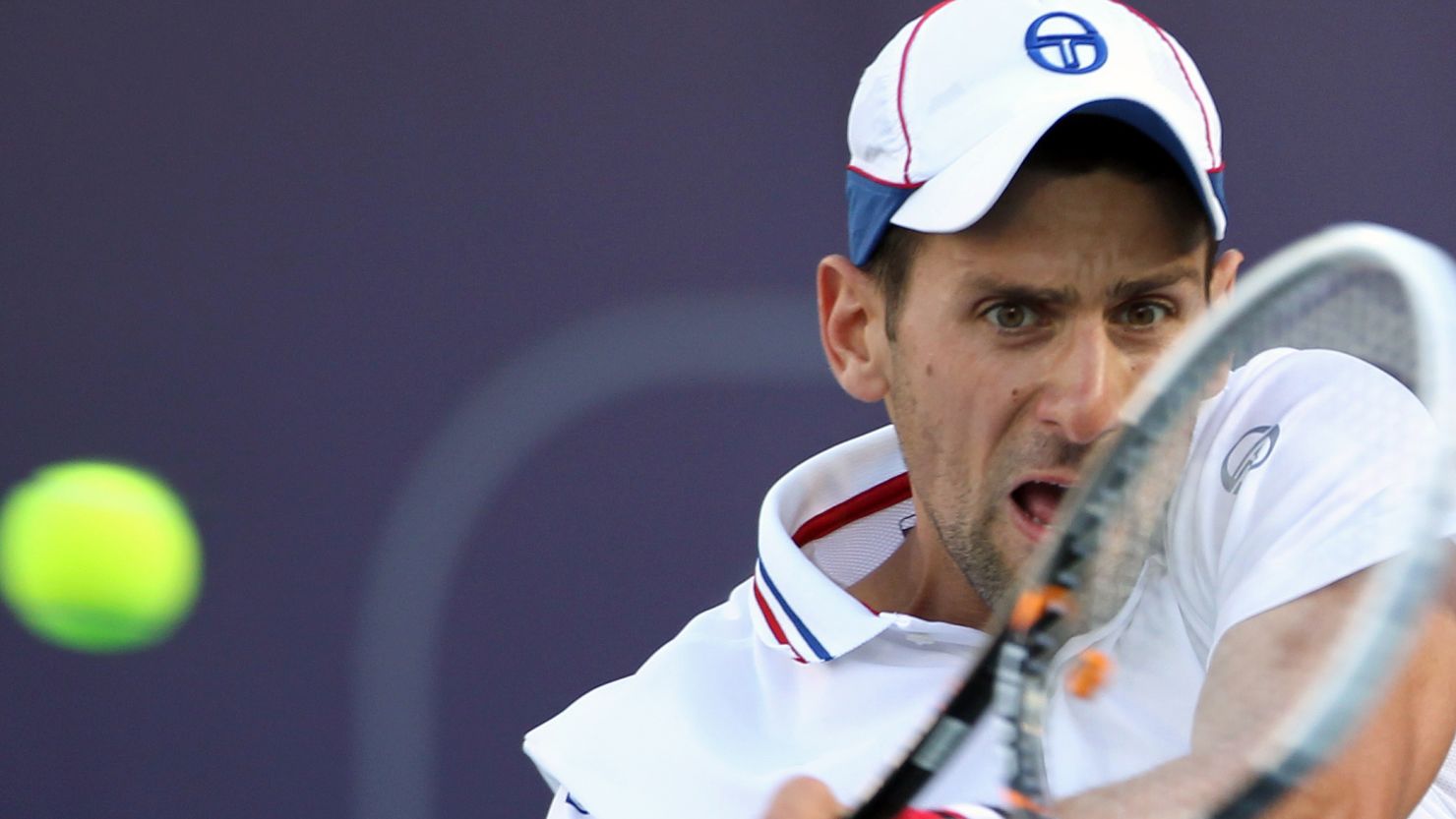 Novak Djokovic plays a return during his straight sets win over Sergiy Stakhovsky in Dubai.