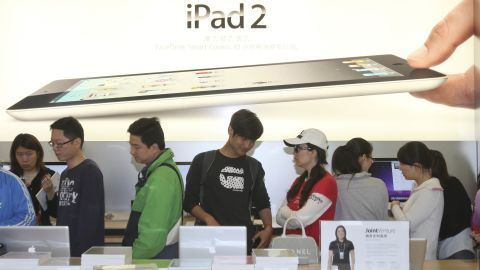 People queue to buy iPad 2 at an Apple store on May 6, 2011 in Shanghai, China. 