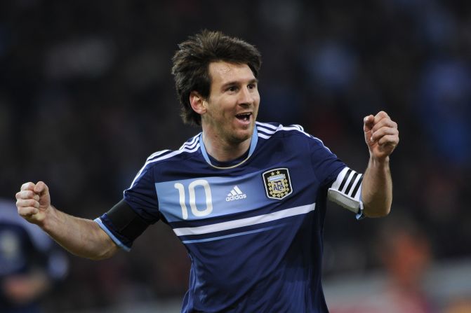 Barcelona ace Lionel Messi celebrates the opening goal of his hat-trick in Argentina's friendly win over Switzerland.