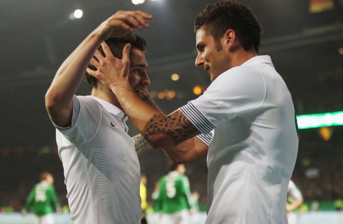 Olivier Giroud (right) of France celebrates with his teammate Mathieu Debuchy after scoring their opener against Germany. Florent Malouda grabbed the second in a 2-1 win.