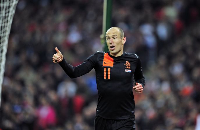 Arjen Robben wheels away after scoring the first of his goals for the Dutch at Wembley.  
