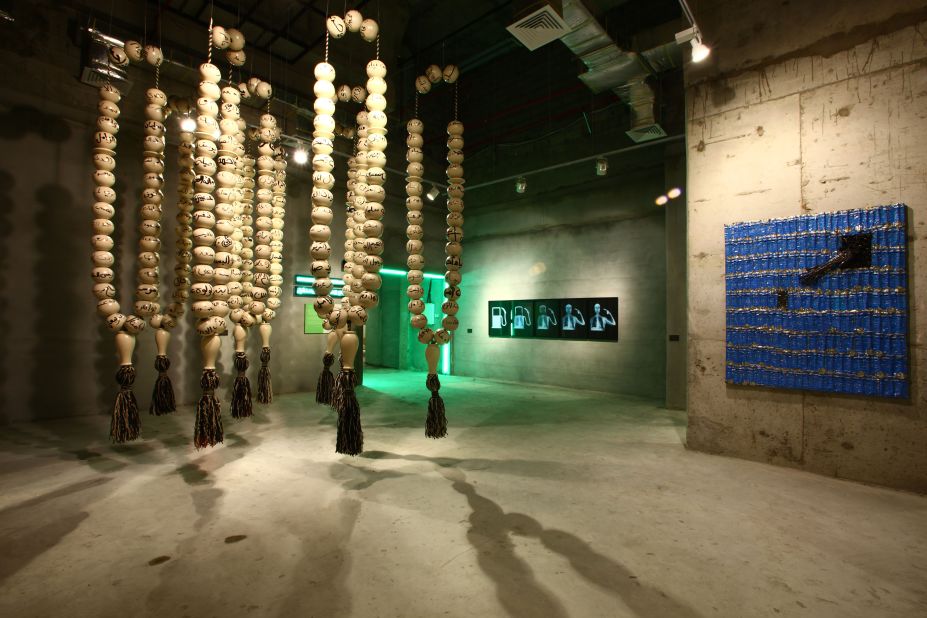 The wooden balls were then strung up, resembling prayer beads, at the Edge of Arabia contemporary art show in Jeddah.