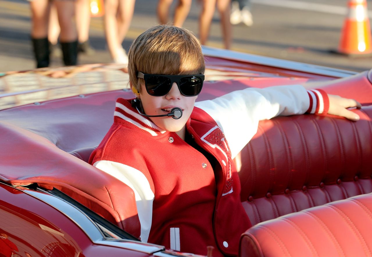 Complete with a letterman jacket and a drum solo, Bieber surprises fans in an outdoor performance at the MTV Video Music Awards in Los Angeles in September 2010.