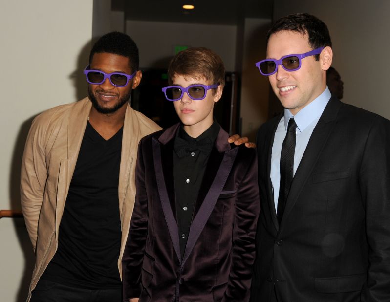 The pop idol attends the Los Angeles premiere of "Justin Bieber: Never Say Never," a 3-D documentary on his rise to stardom, in February 2011. He's accompanied by Usher and manager Scooter Braun.