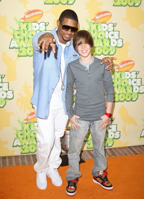 At 15, Bieber had yet to become synonymous with the ubiquitous single "Baby." At this point, he was soaking up all he could learn from his mentor, Usher, whom he attended the Nickelodeon Kids' Choice Awards in March 2009.
