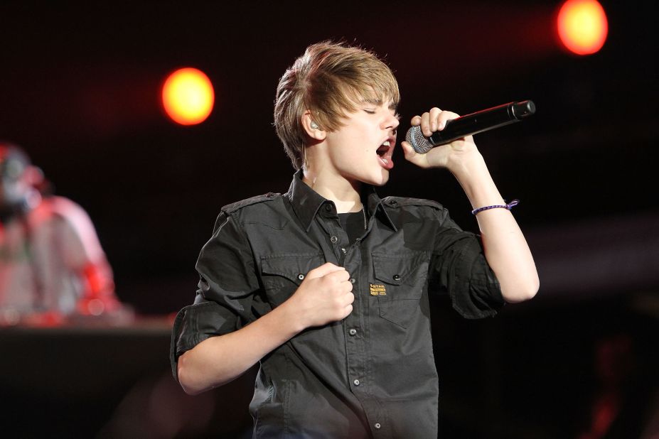 By early 2010, Bieber had notched a chart-scaling album with "My World" and was ready to release "My World 2.0," which contained the single "Baby." Here, Bieber performs at the Pepsi Super Bowl Fan Jam in Miami Beach in February 2010.