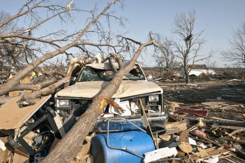 Downed trees crush a truck Wednesday after a tornado hit in Harveyville, Kansas. A state of emergency was declared in the town about 20 miles southwest of Topeka.