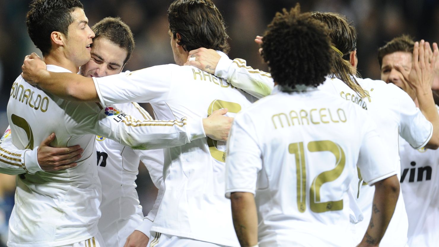 Real Madrid players celebrate Cristiano Ronaldo's opener against Espanyol.