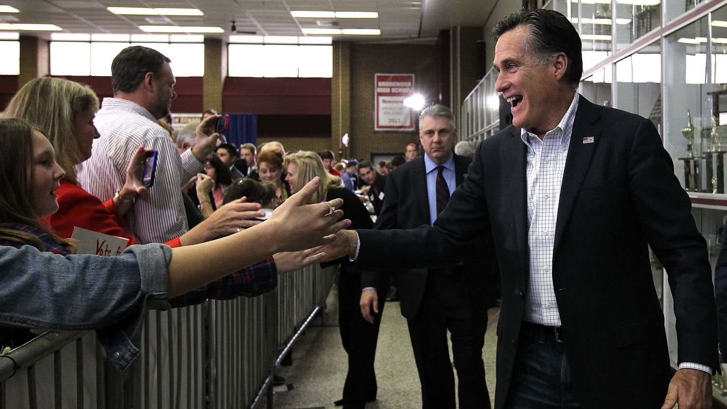 Republican presidential candidate Mitt Romney greets supporters at a pancake breakfast Sunday in Snellville, Georgia.
