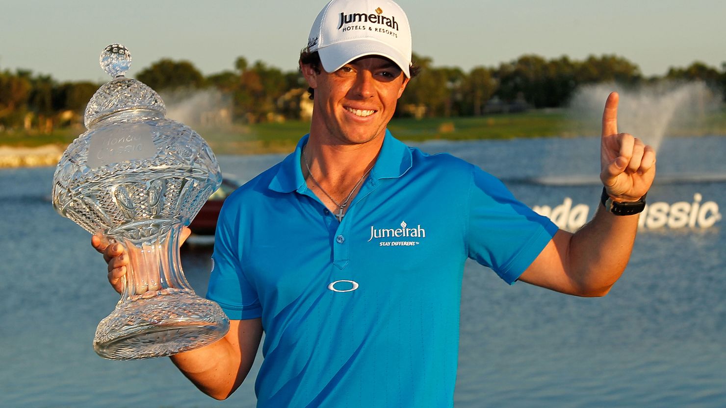 Rory McIlroy holds the trophy aloft after winning the Honda Classic in Florida.