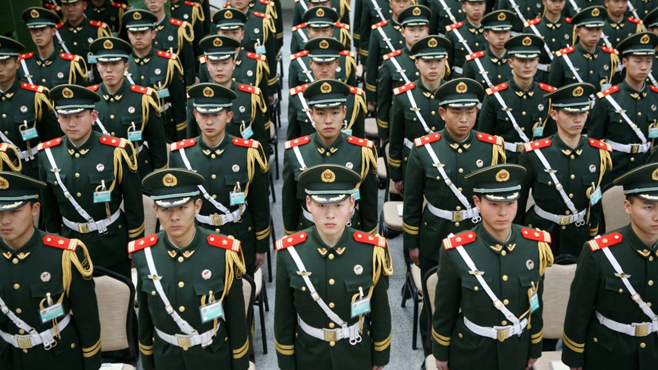 Chinese paramilitary police undergo a drill to prepare for the upcoming National People's Congress in Beijing.