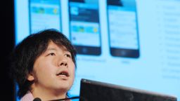 Gree CEO Yoshikazu Tanaka speaks during a press conference in Paris on February 21, 2012.