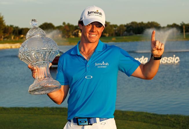 Top of the world: McIlroy's <a href="index.php?page=&url=http%3A%2F%2Fwww.edition.cnn.com%2F2012%2F03%2F04%2Fsport%2Fgolf%2Fgolf-mcilroy-honda-woods%2Findex.html">victory at the Honda Classic</a> has seen him replace England's Luke Donald at the top of the world rankings.   