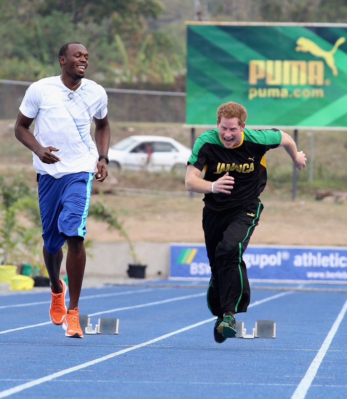 "There's always the unexpected with Harry," says Larcombe, recalling a trip to Jamaica in 2012 when the prince challenged sprinter Usain Bolt to a race. "Nobody knew he was going to do that."