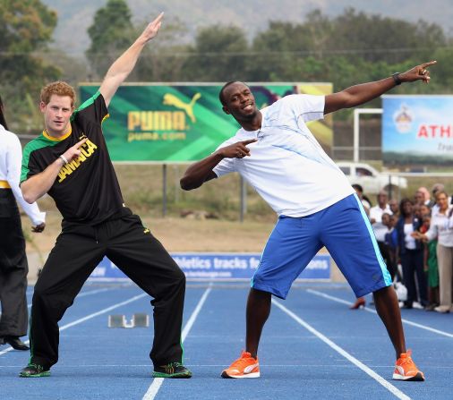 March 2012: Prince Harry poses with sprinter Usain Bolt in Kingston, Jamaica.