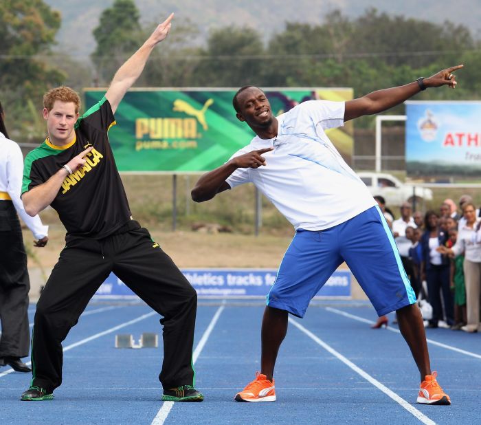March 2012: Prince Harry poses with sprinter Usain Bolt in Kingston, Jamaica.