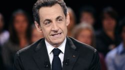 France's president Nicolas Sarkozy poses before taking part in the TV broadcast on March 6, 2012 in Paris.