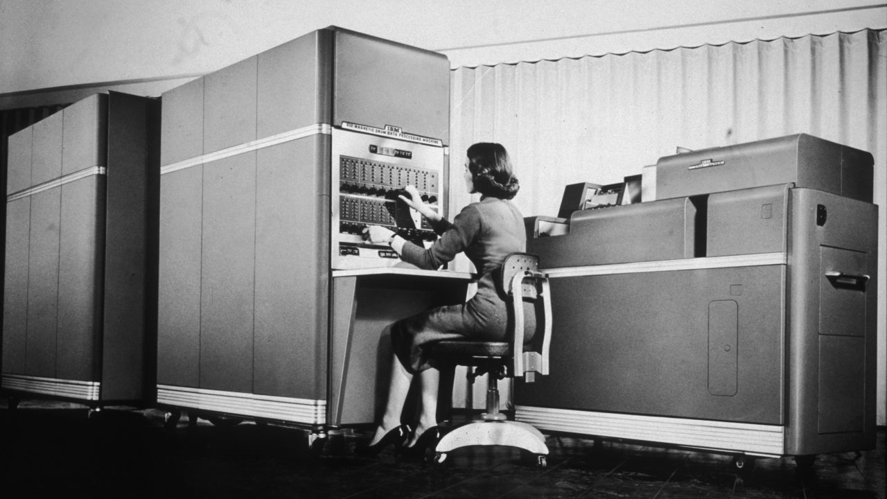 A woman operates one of the early desktop IBM computers in this photo from 1955. Today, desktop and laptop computers are on the decline as consumers flock toward tablet devices. Dell's first quarter profit plunged 79% because of slower PC sales. 