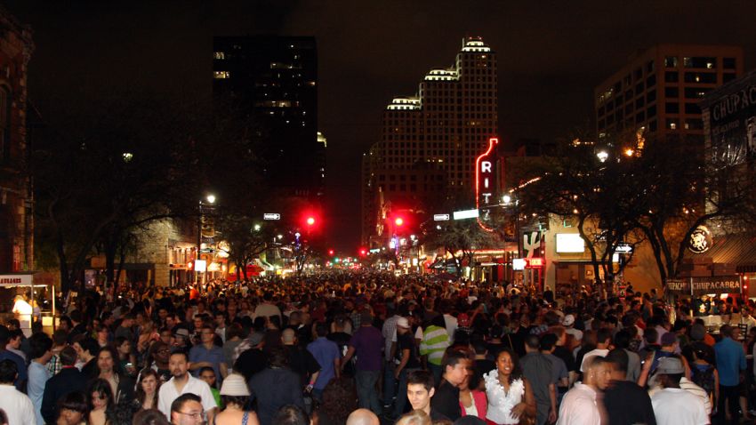 People celebrate on 6th Street in Austion during SXSW