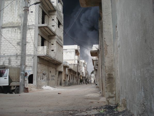 As the Syrian military rained fire on the restive city of Homs, many streets were deserted.