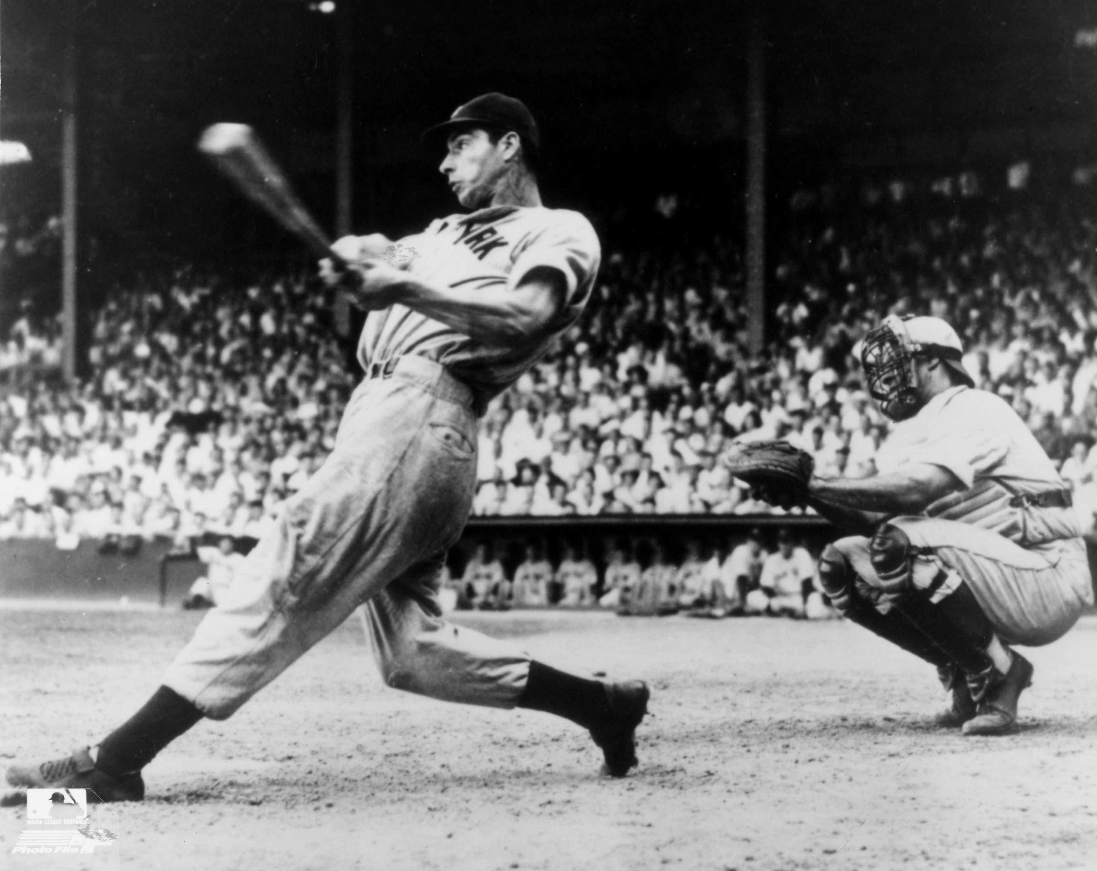 NY Yankee great Joe DiMaggio waiting to be introduced at the Annual News  Photo - Getty Images