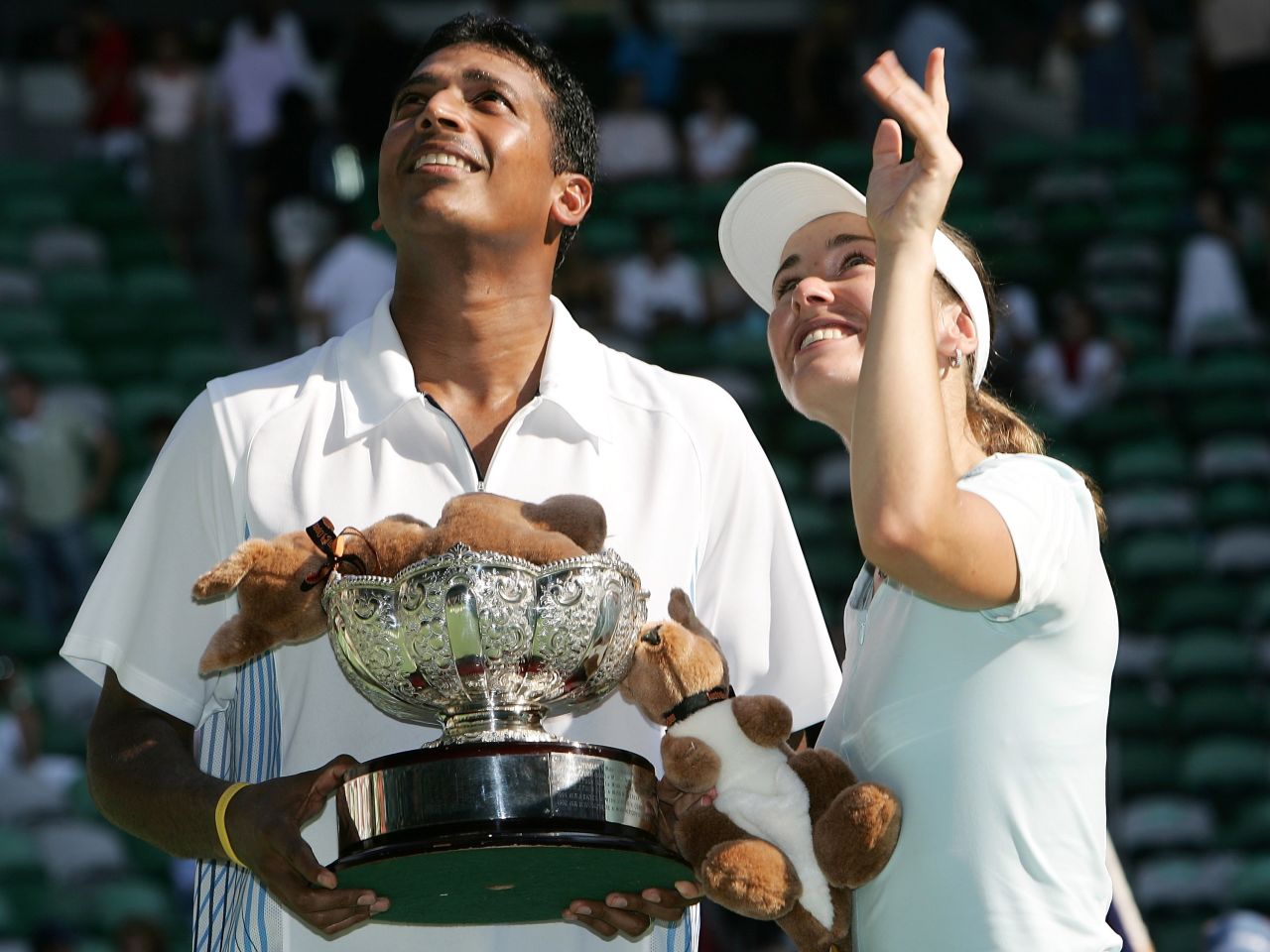 Bhupathi's 11 grand slam titles have come with a total of eight different partners. Here he celebrates his mixed doubles success at the 2006 Australian Open with former women's world No. 1 Martina Hingis of Switzerland.