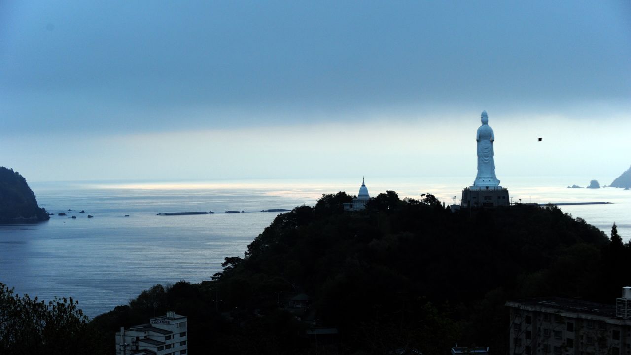 A huge Buddha statue looks over the bay in 2011 in the tsunami-devastated city of Kamaishi, Japan. 