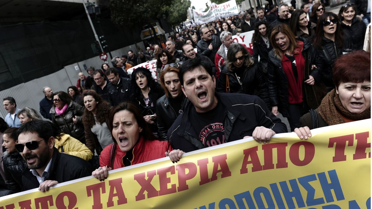Greece's caretaker PM claims that most Greeks want to stay in the Eurozone, despite frequent anti-austerity demonstrations. 