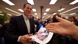 Rick Santorum greets supporters at a small business in Lenexa, Kansas, during a campaign stop this week.