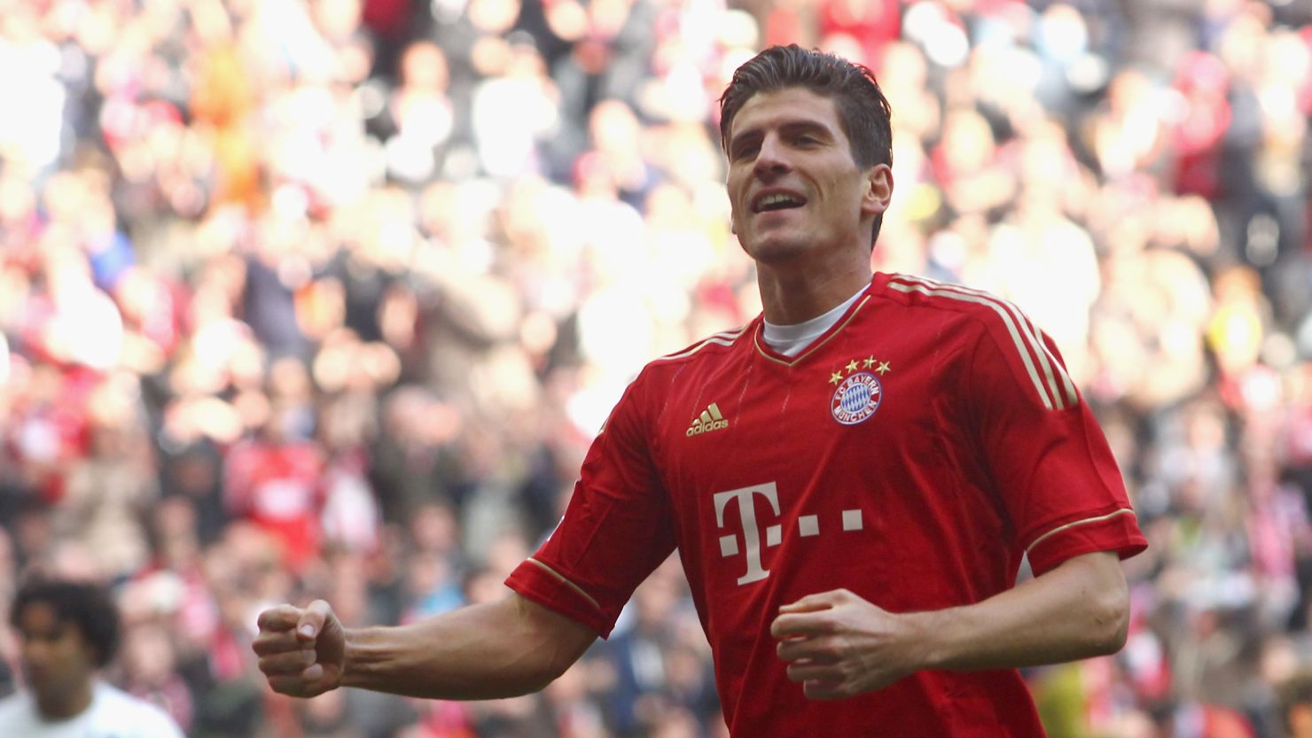 Mario Gomez celebrates his opening goal in Bayern Munich's 7-1 rout of Hoffenheim.