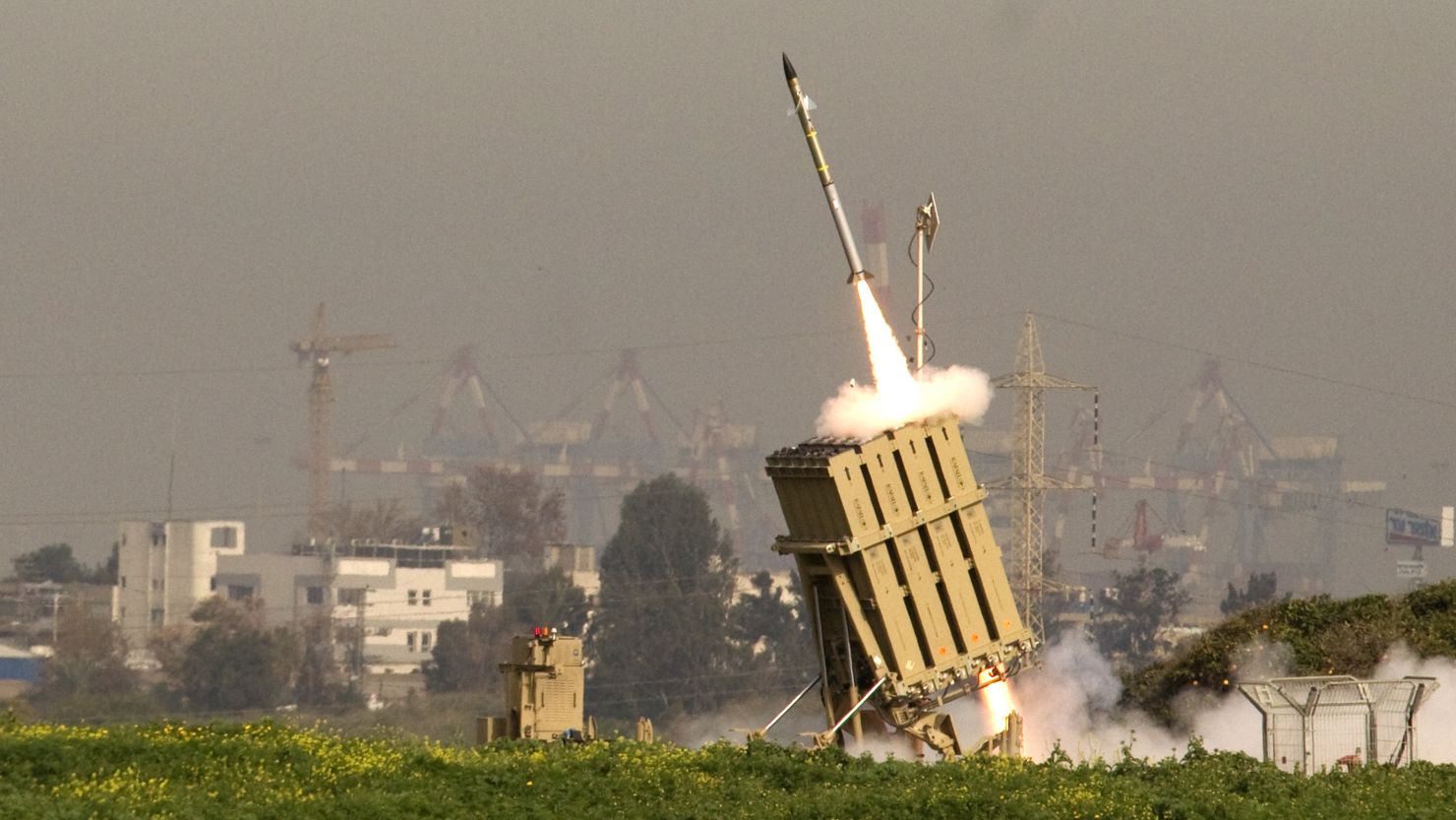 An Israeli missile is launched from the Iron Dome anti-rocket system in the city of Ashdod on Sunday.