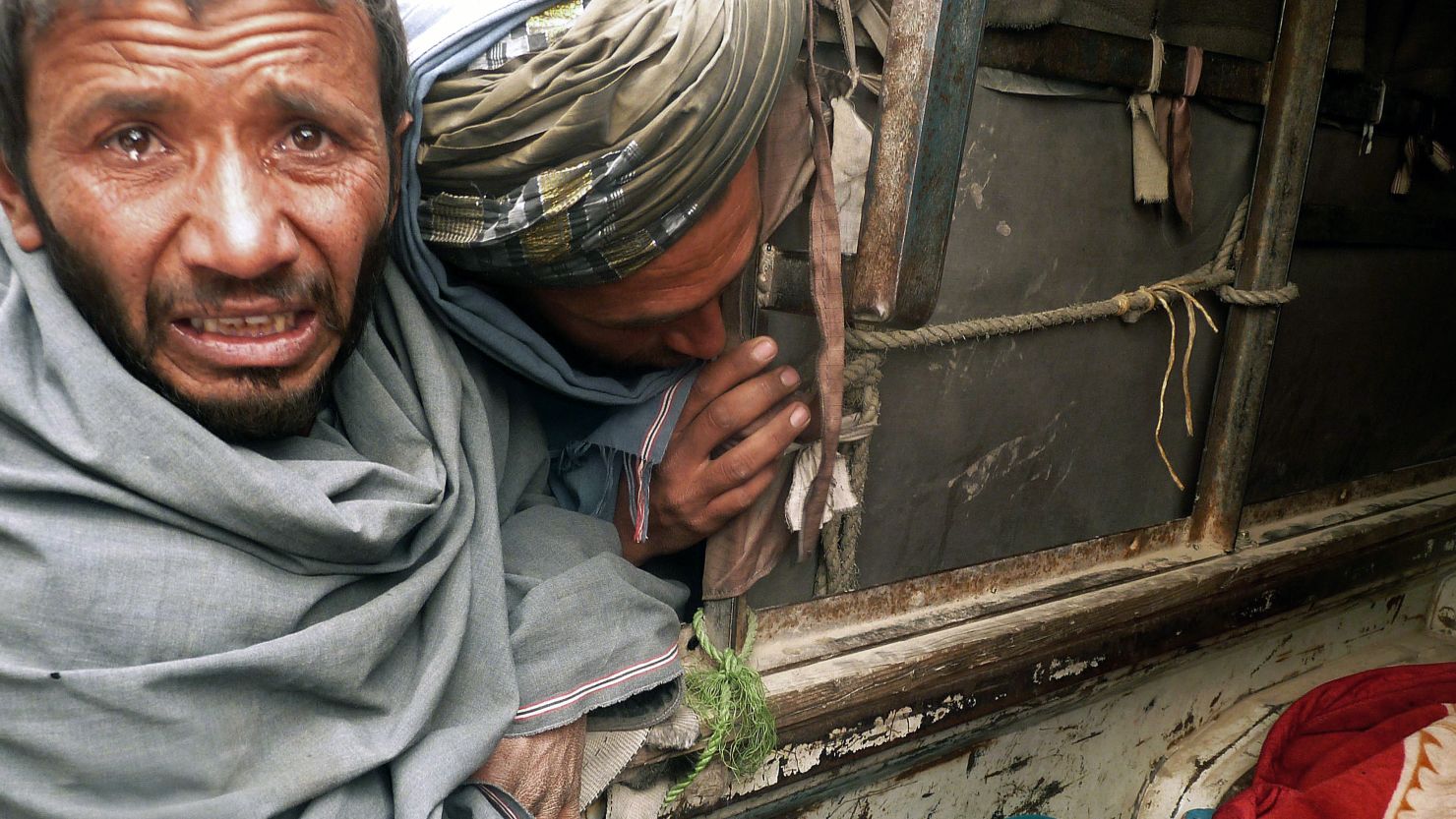 Afghans react to the massacre of 16 civilians on Sunday, including nine children and three women.