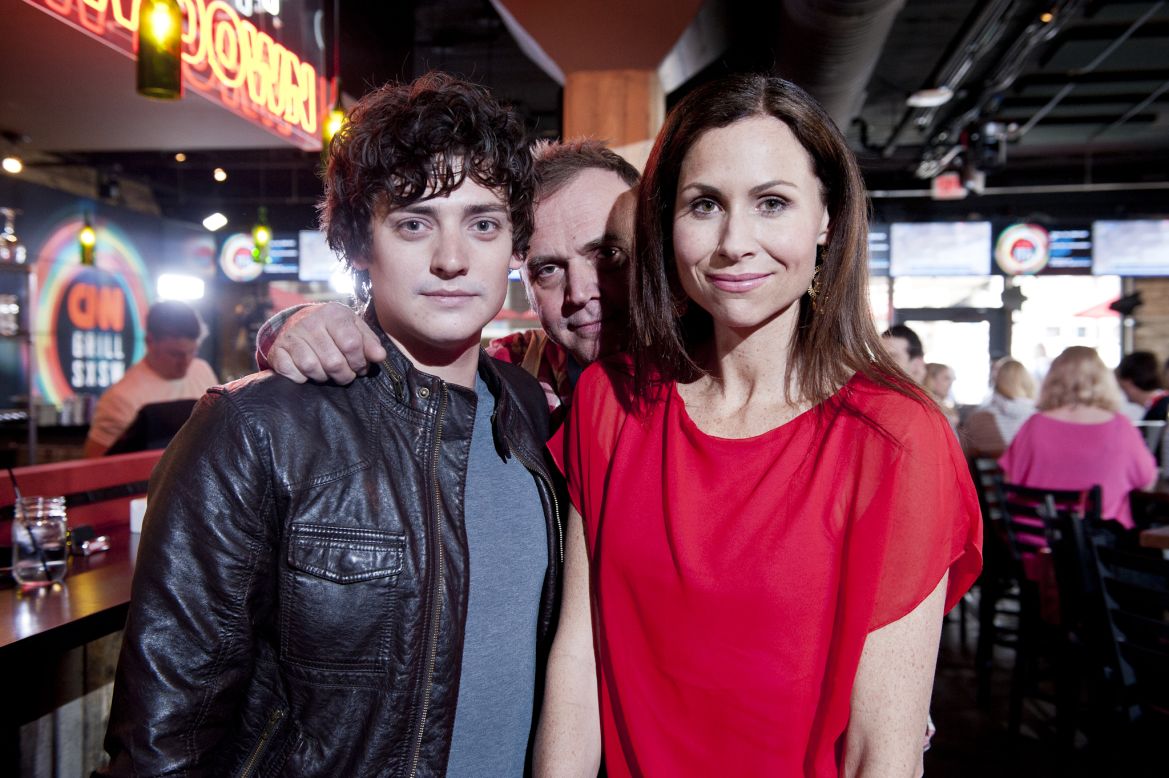 Actor Aneurin Barnard, director Mark Evans and actress Minnie Driver pose for a photo at the CNN Grill. The three worked together on the 2011 film "Hunky Dory."