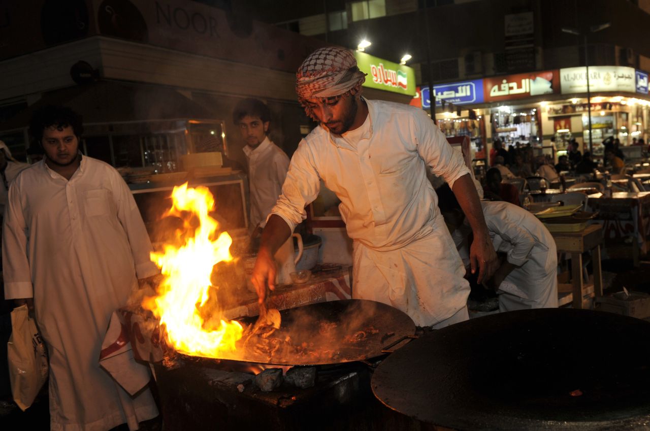 A traditional Saudi dish of shredded meat being prepared in an outdoor restaurant in Jeddah, Saudi Arabia. Smarter restaurants are slowly developing in the city.