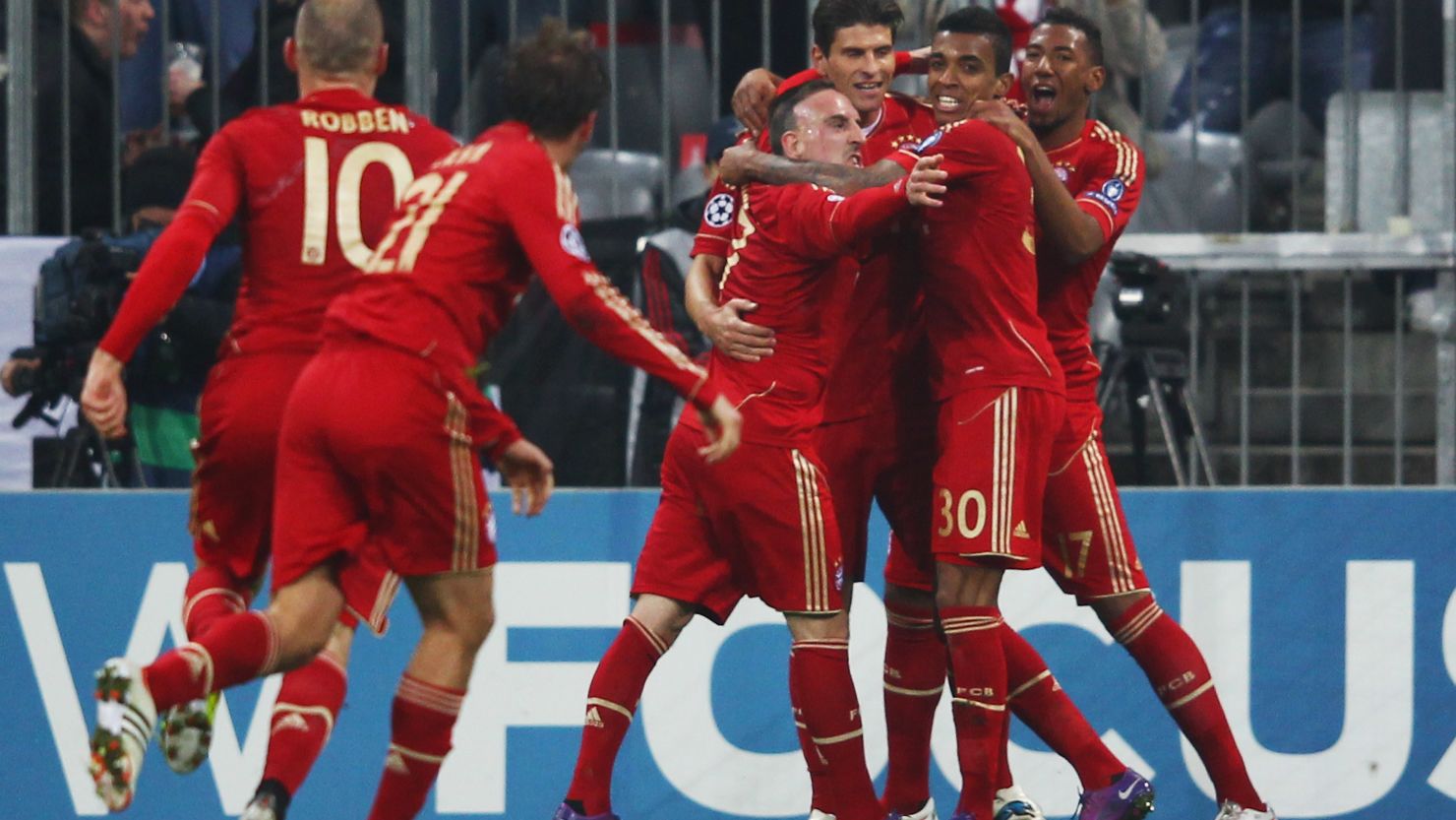 Bayern Munich players celebrate a hat-trick for Mario Gomez in the Allianz Arena.  