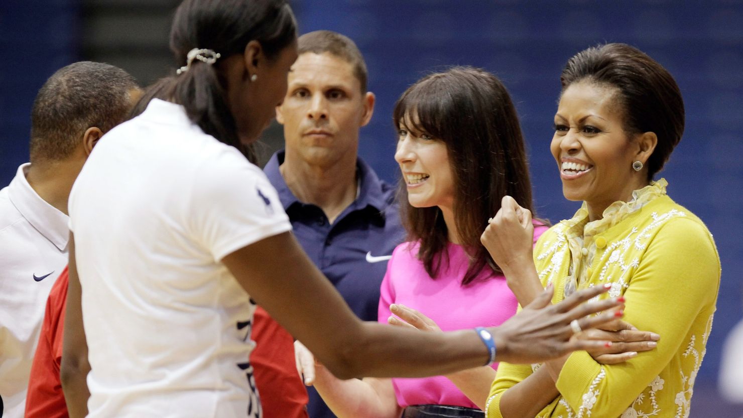Michelle Obama, far right, and Samantha Cameron meet Olympic champions Dan O'Brien and Lisa Leslie. 