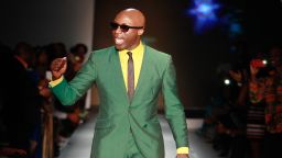 Ozwald Boateng, a British designer of Ghanaian descent, takes to the runway in one of his distinctive creations. Boateng was presented the "Lifetime Achievement Award" at the event.