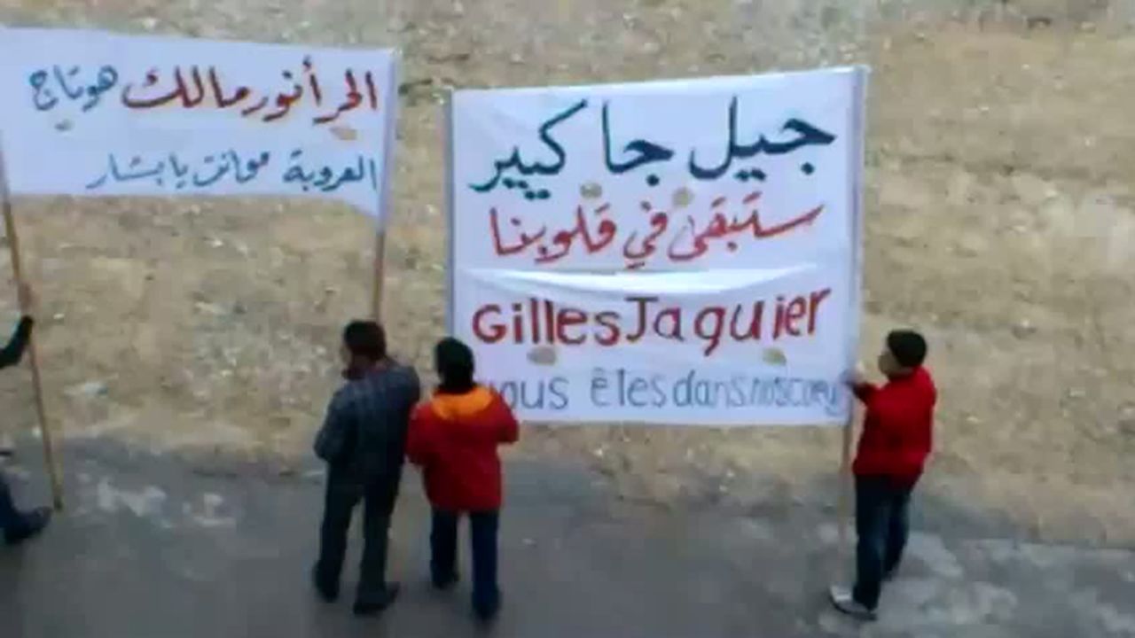 An image grab taken from a video posted on You Tube on January 13, 2012 shows anti-regime demonstrators in Damascus.