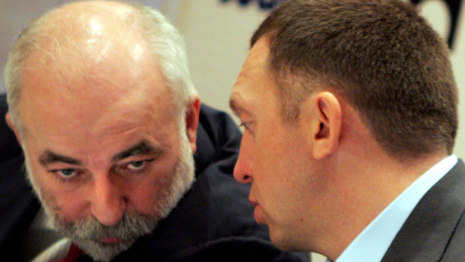 Viktor Vekselberg, left, talks to the Rusal chairman Oleg Deripaska during a press conference in Moscow in October 2006.